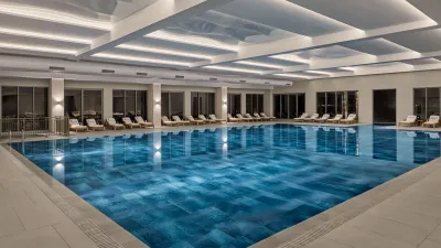 AKRA V HOTEL Pools & Beach