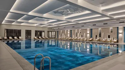 AKRA V HOTEL Pools & Beach