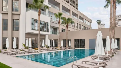 AKRA V HOTEL Pools & Beach
