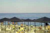CAMYUVA BEACH HOTEL Pools & Beach