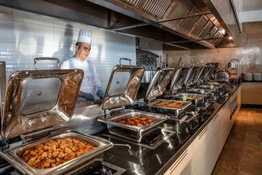 CHARISMA DELUXE HOTEL Restaurants