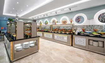 CLUB BIG BLUE SUITE HOTEL Restaurants