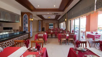 CLUB SIDE COAST HOTEL Restaurants