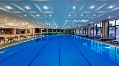 DELPHIN DELUXE RESORT Pools & Beach