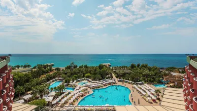 DELPHIN DELUXE RESORT Pools & Beach