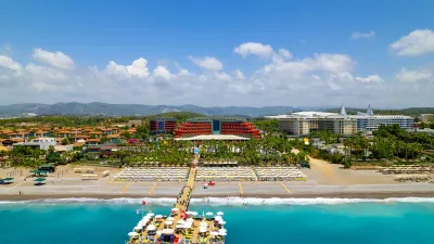 DELPHIN DELUXE RESORT Pools & Beach