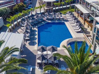 DIONYSOS HOTEL Pools & Beach