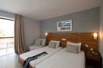DIONYSOS HOTEL Rooms
