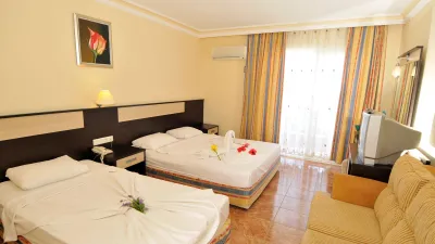 FIRST CLASS HOTEL Rooms