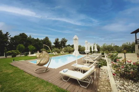 GEORGALAS SUN BEACH VILLA Pools & Beach