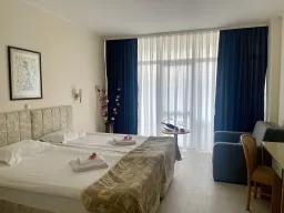 GRAND HOTEL NIRVANA Rooms