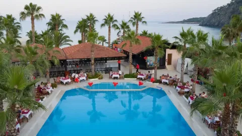 MG CLUB AKMAN BEACH HOTEL Pools & Beach