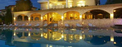 PORTES BEACH HOTEL Pools & Beach