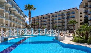 RAMADA HOTEL - SUITES BY WYNDHAM KUSADASI Pools & Beach