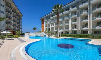 RAMADA HOTEL - SUITES BY WYNDHAM KUSADASI Pools & Beach