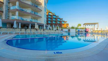 RAMADA HOTEL - SUITES BY WYNDHAM KUSADASI Pools & Beach